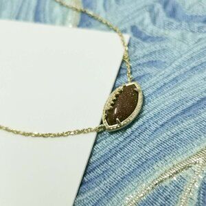 Kendra Scott Football Gold Orange Goldstone Short Pendant Necklace. New